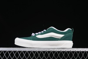 Classic Green Suede Skate Shoes with Signature Wave Design