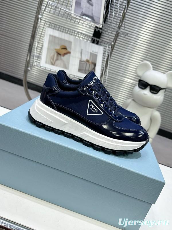 2025 Women Prada Blue Leather Sneakers KFY00310