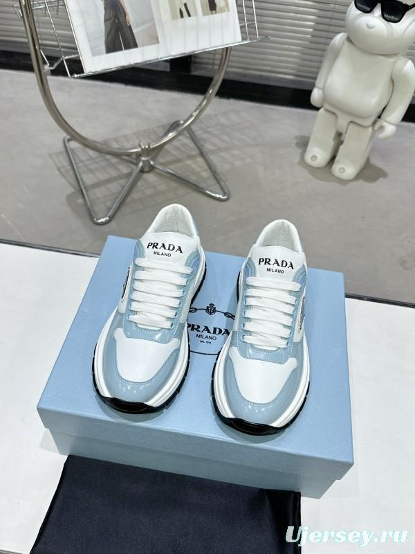 2025 Women Prada Light Blue White Leather Sneakers KFY00310