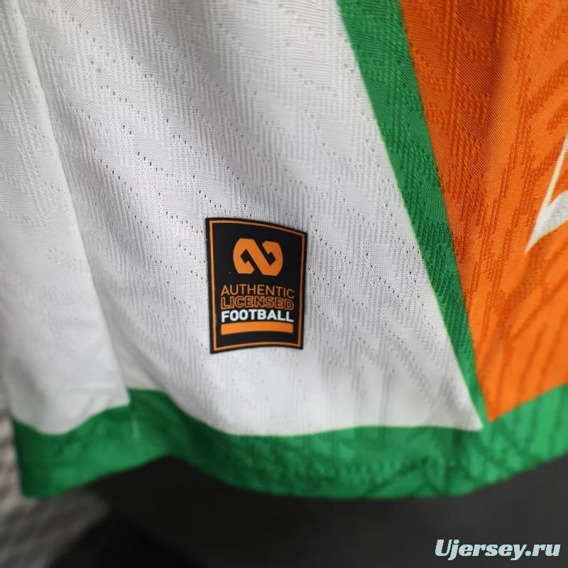 Player Version 2025 Ivory Coast Orange with Elephant Graphic and Green Accents Jersey